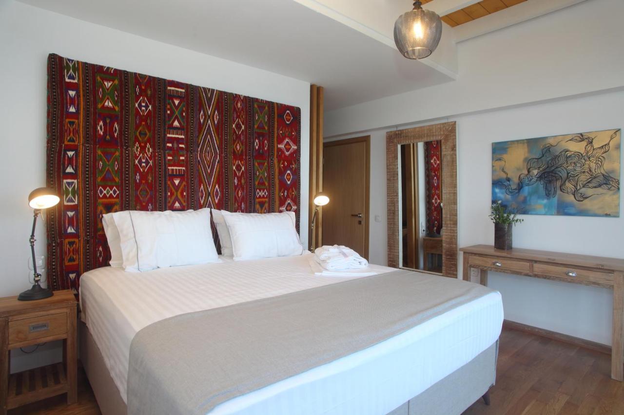 Capro - Milos Bay Villas อาโยส นิกีตัส ภายนอก รูปภาพ
