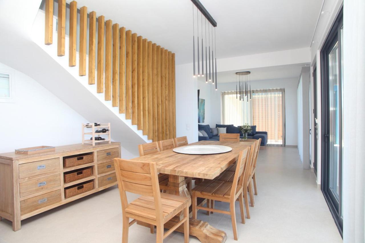 Capro - Milos Bay Villas อาโยส นิกีตัส ภายนอก รูปภาพ