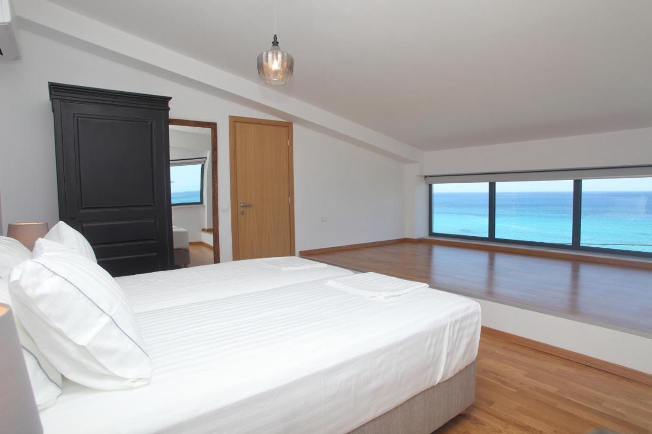 Capro - Milos Bay Villas อาโยส นิกีตัส ภายนอก รูปภาพ