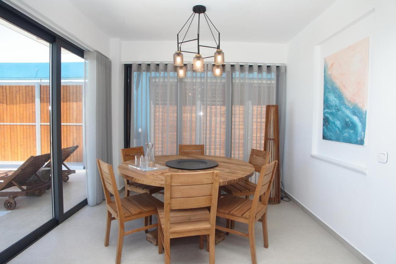 Capro - Milos Bay Villas อาโยส นิกีตัส ภายนอก รูปภาพ