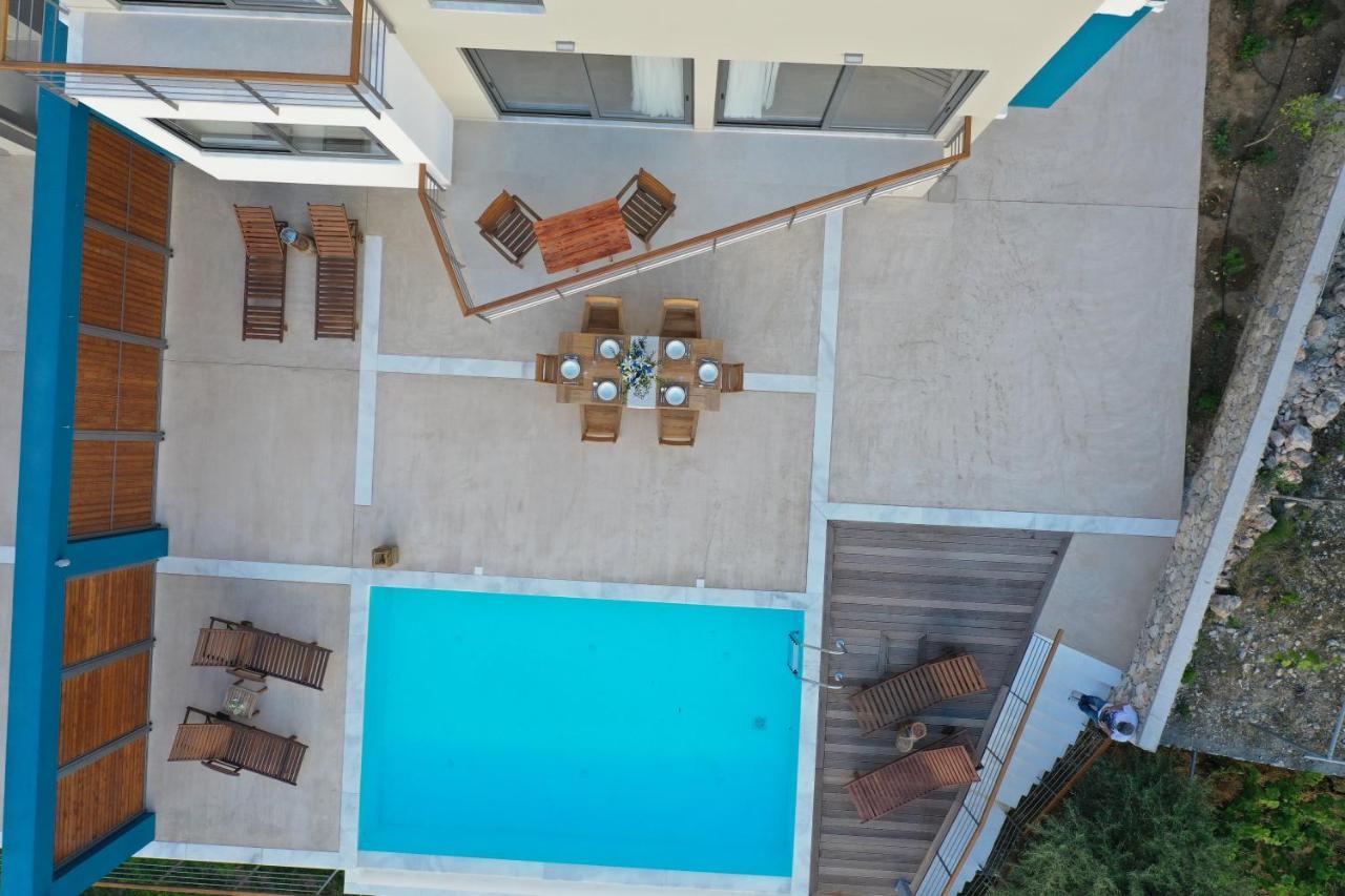 Capro - Milos Bay Villas อาโยส นิกีตัส ภายนอก รูปภาพ